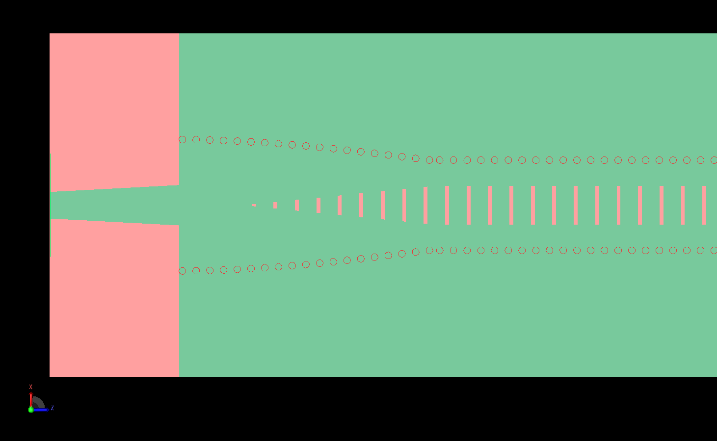 图 2：天线一端的细节图，显示了位于微带线下方的锥形槽和弯曲通孔路径。